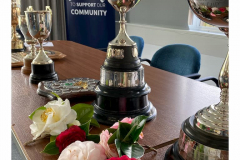 trophies-on-table-at-prize-giving